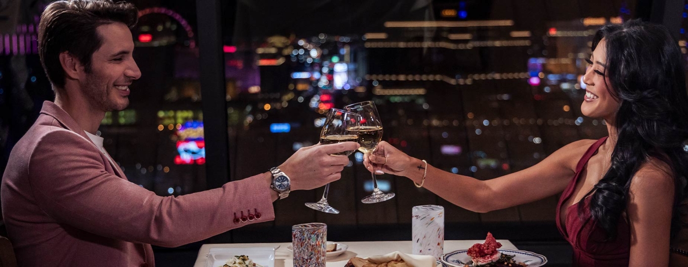 Couple toasting at Vetri Cucina